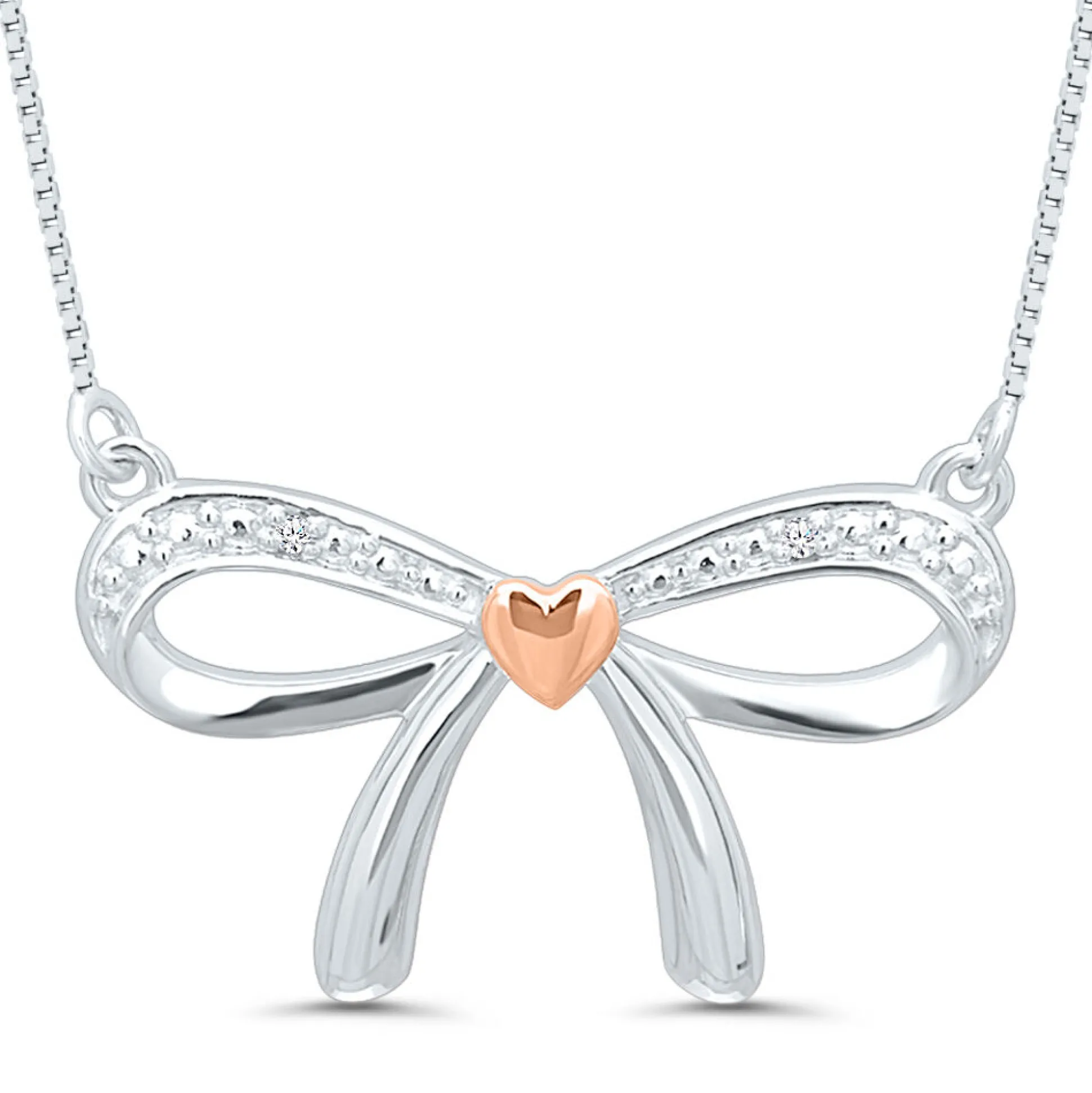 Bow Pendant With Diamond Accents In Sterling Silver